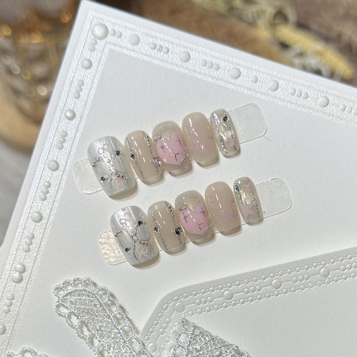 Decorative Press-On Nail Set with Heart and Silver Accents Stornfield
