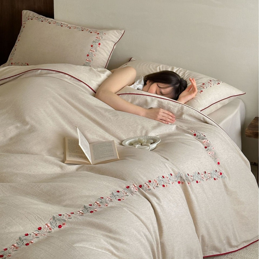 Linen bedding set with floral embroidery border