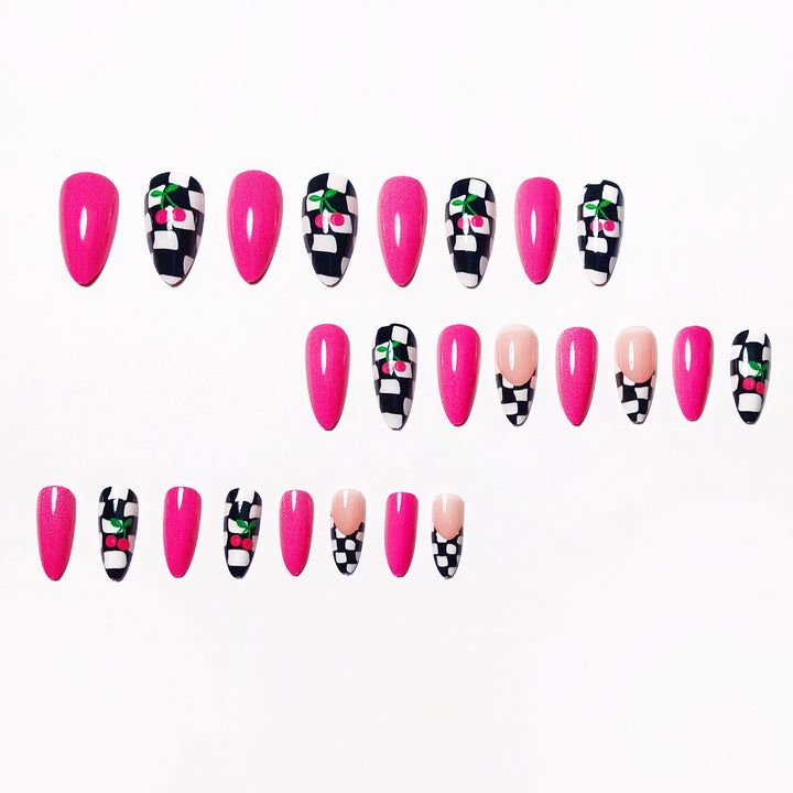 Creative artificial nails with playful cherry and checkerboard design Stornfield