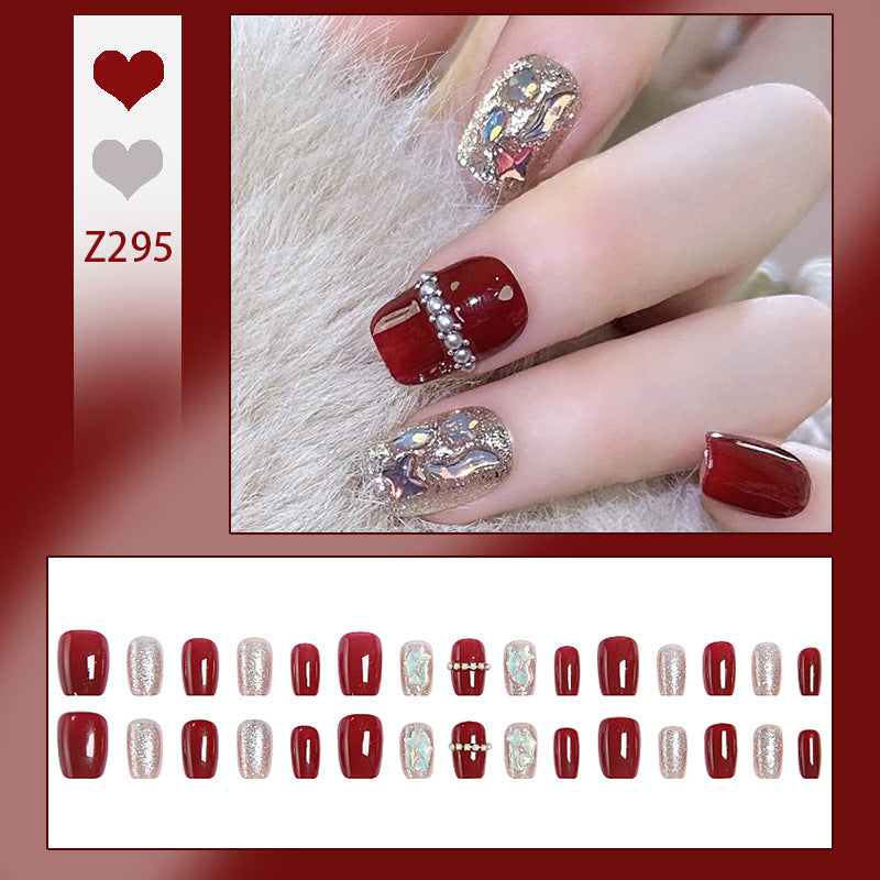Glamorous artificial nail set with sparkling 3D applications and elegant embellishments Stornfield