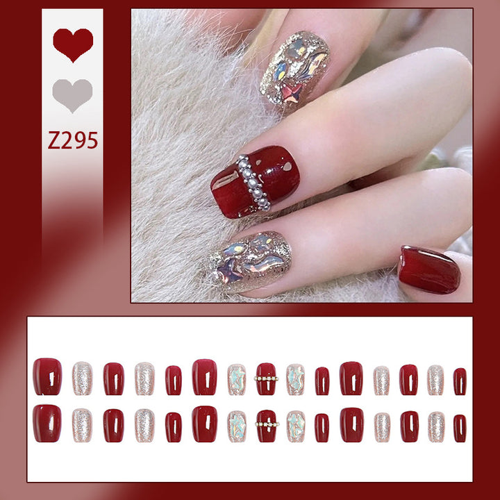 Glamorous artificial nail set with sparkling 3D applications and elegant embellishments Stornfield