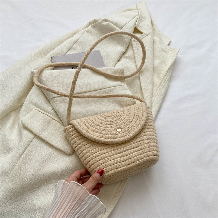 Hand-knotted mini bag with curved design Stornfield