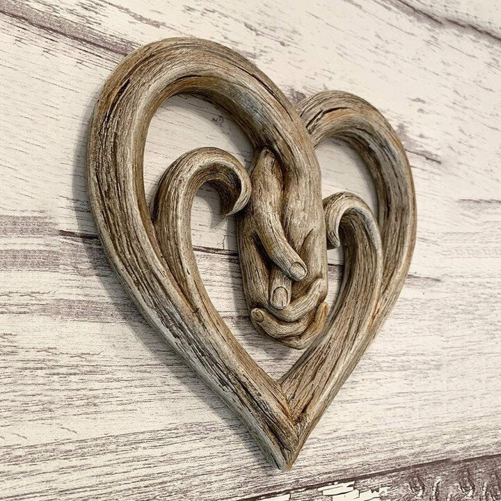 Heart-Shaped Holding Hands Sculpture