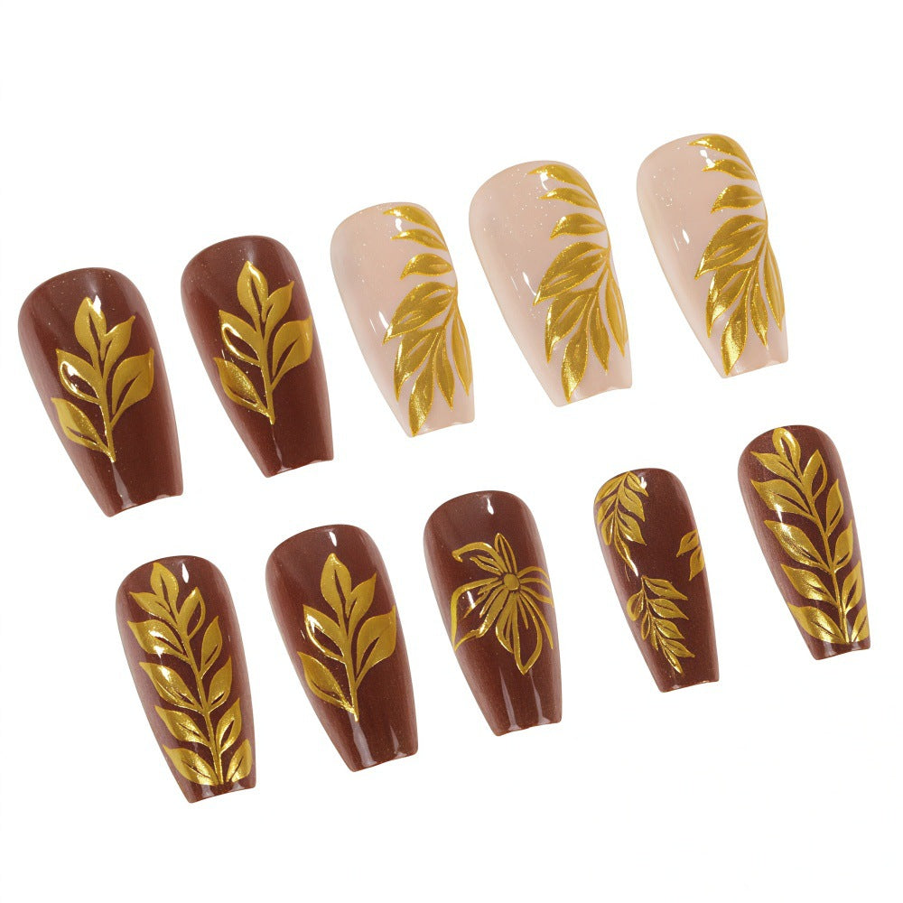 Artificial nails with floral gold design Stornfield