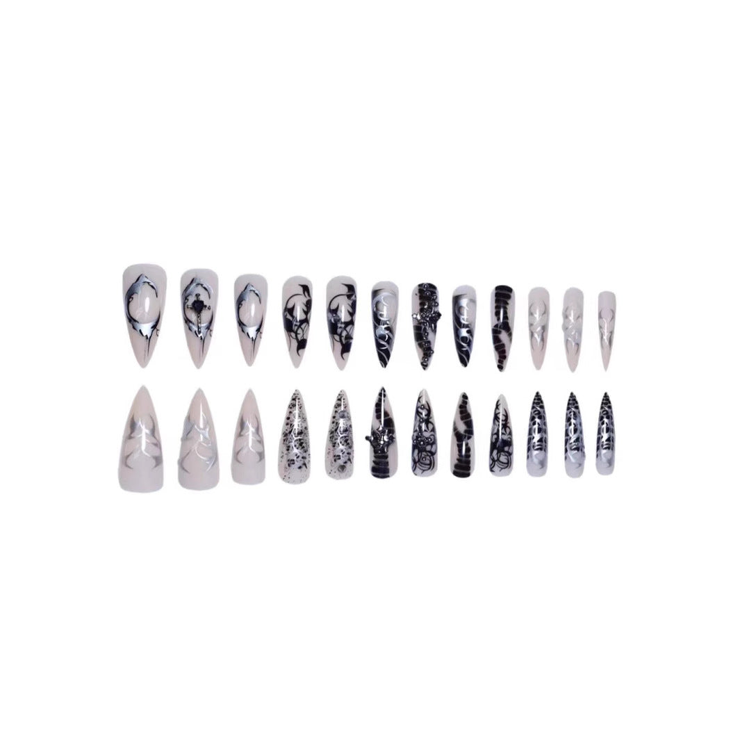 Artistic Stiletto Nail Enhancements with Intricate Patterns Stornfield
