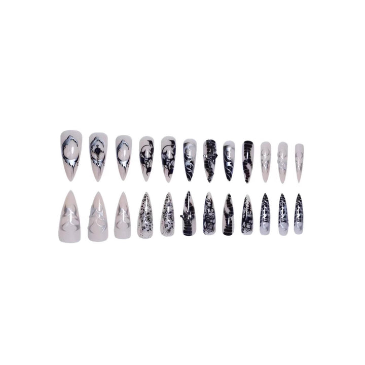 Artistic Stiletto Nail Enhancements with Intricate Patterns Stornfield