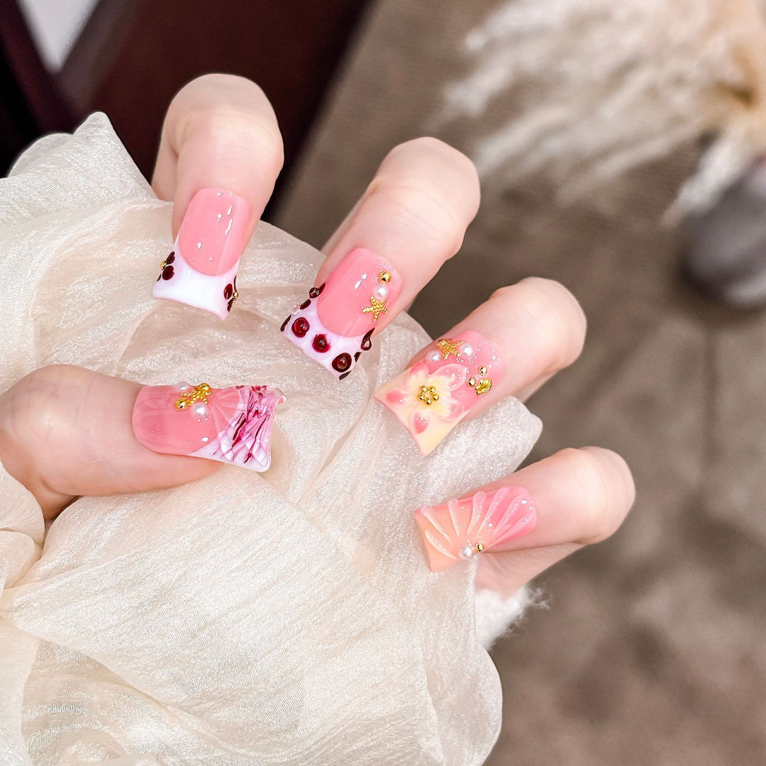 Artistic Acrylic Nail Design with Gem Accents