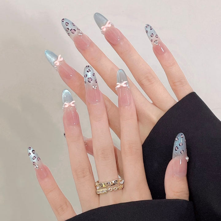 Artistic Press-On Nail Set with Unique Bow and Heart Accents Stornfield
