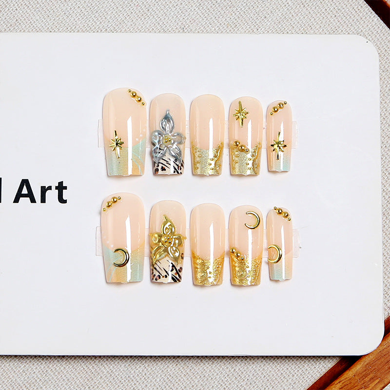 Artificial nail set with floral 3D applications and elegant decorations Stornfield