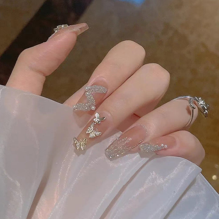 Artificial nails with glitter and heart design Stornfield