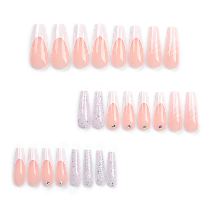 Artificial nail extensions with elegant glitter design Stornfield