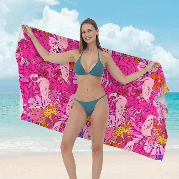 Beach towel with vibrant tropical plant motif Stornfield