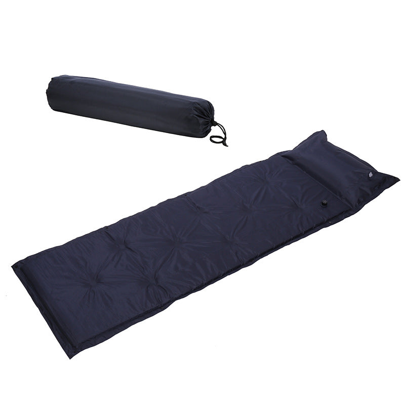 tufted insulated roll-out camping sleep mat with integrated pillow and modular snap connectors Stornfield