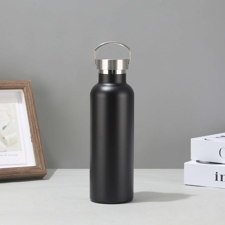 Women's stainless steel insulated drinking bottle with sustainable bamboo lid Stornfield