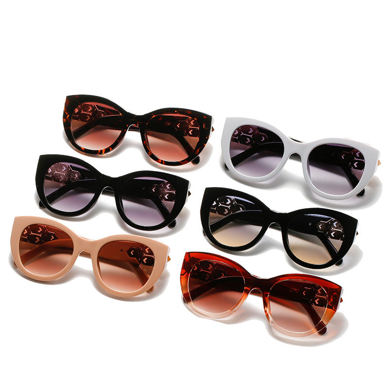 Fashion-Forward Cat-Eye Sunglasses with Decorative Accents Stornfield