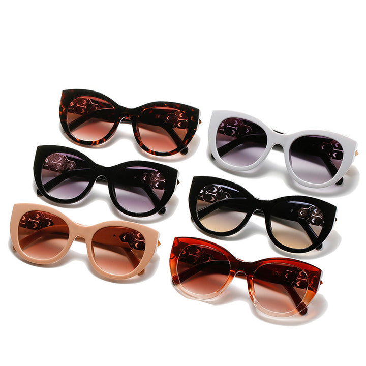Fashion-Forward Cat-Eye Sunglasses with Decorative Accents Stornfield
