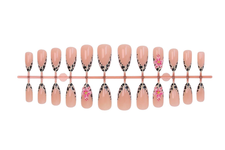 Nail art set with trendy floral designs and elegant dots Stornfield