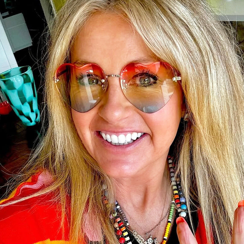 Women's Heart-Shaped Sunglasses with Mirrored Lenses and Fashionable Metal Frame Stornfield