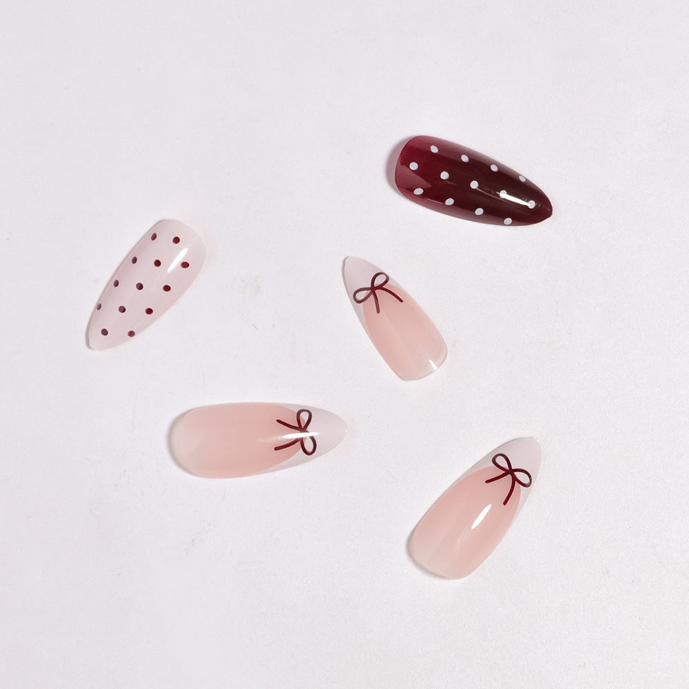 Artistic Press-On Nail Set with Bow and Dot Design Stornfield