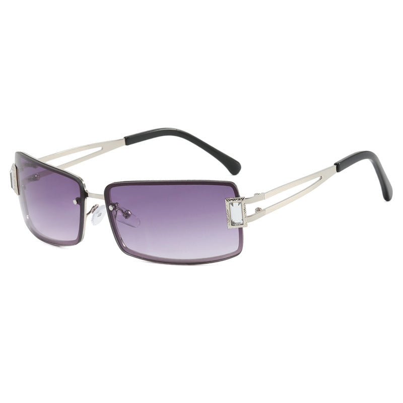 Ladies stylish sunglasses with elegant trapezoidal lenses and filigree metal frame Stornfield