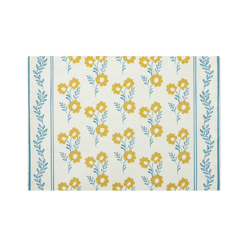 Floral woven bath mat with jacquard structure, absorbent cotton surface and non-slip underside Stornfield