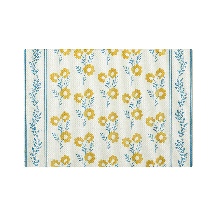Floral woven bath mat with jacquard structure, absorbent cotton surface and non-slip underside Stornfield