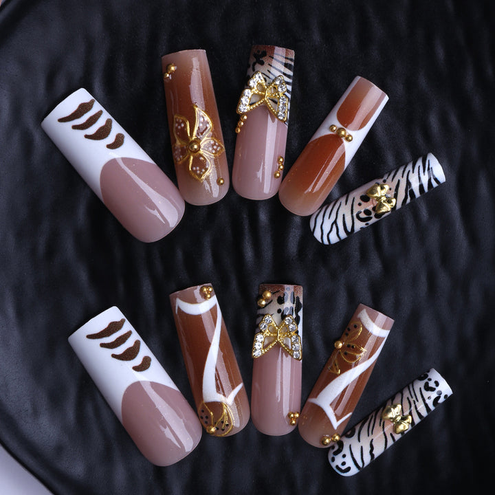 Artificial nails with unique animal and flower motifs Stornfield