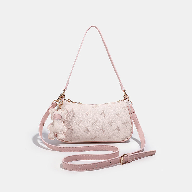 Stylish Handheld Purse with Unique Teddy Charm
