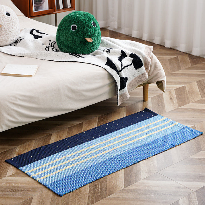 woven living room runner with fringes and geometric weave pattern