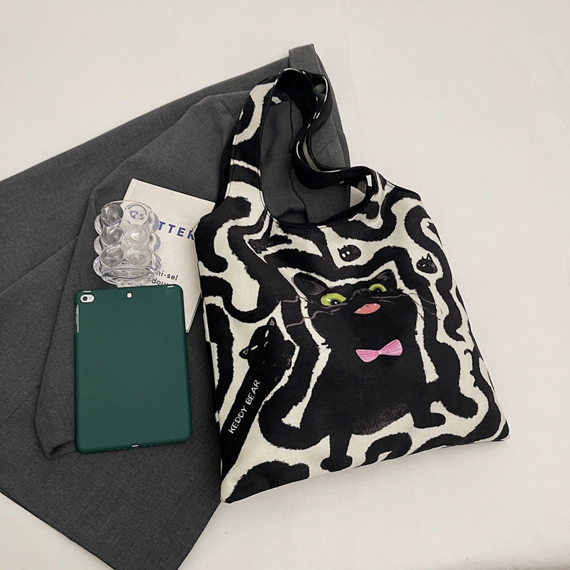 Shoulder bag with playful cat motif Stornfield