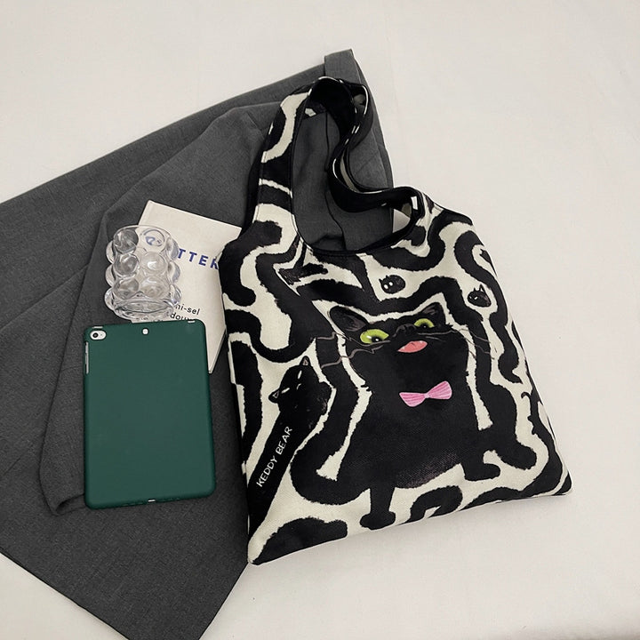 Shoulder bag with playful cat motif Stornfield