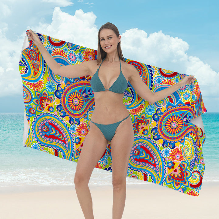 Beach towel with vibrant tropical plant motif Stornfield