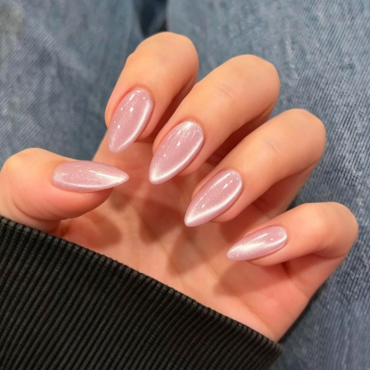 Glamorous artificial nails with shimmering effect and elegant shape Stornfield