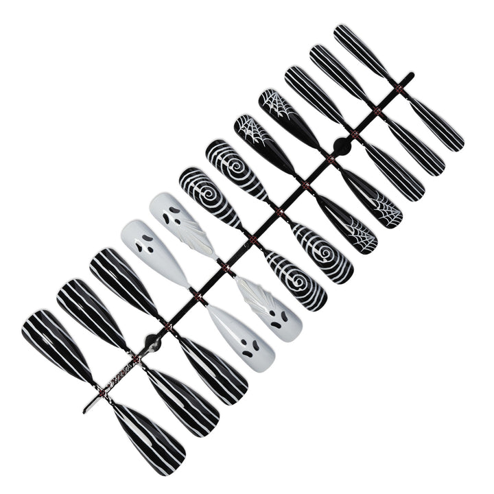 Creative nail art set with spooky designs Stornfield