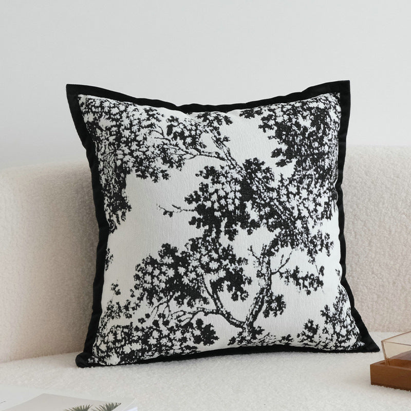 Decorative pillow with tree motif
