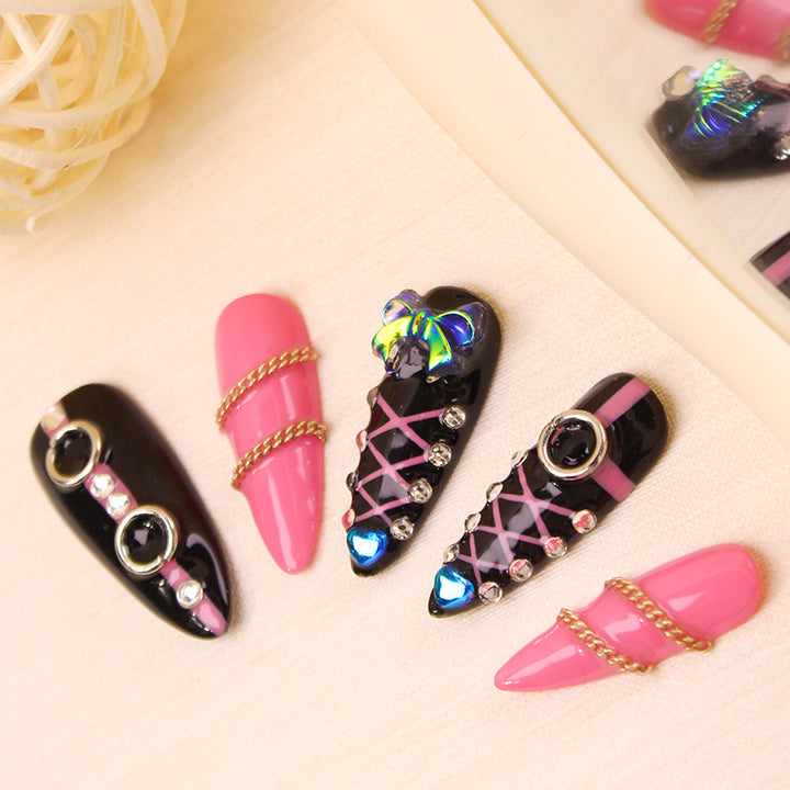 Acrylic nail set with glamorous accents and creative designs Stornfield