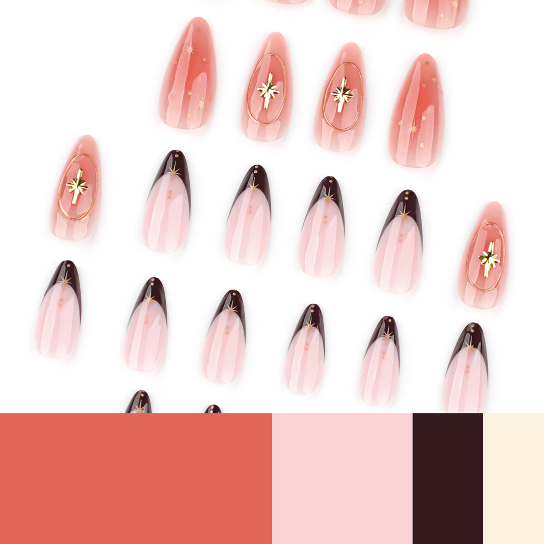Artful stiletto nails with elegant gold embellishments Stornfield