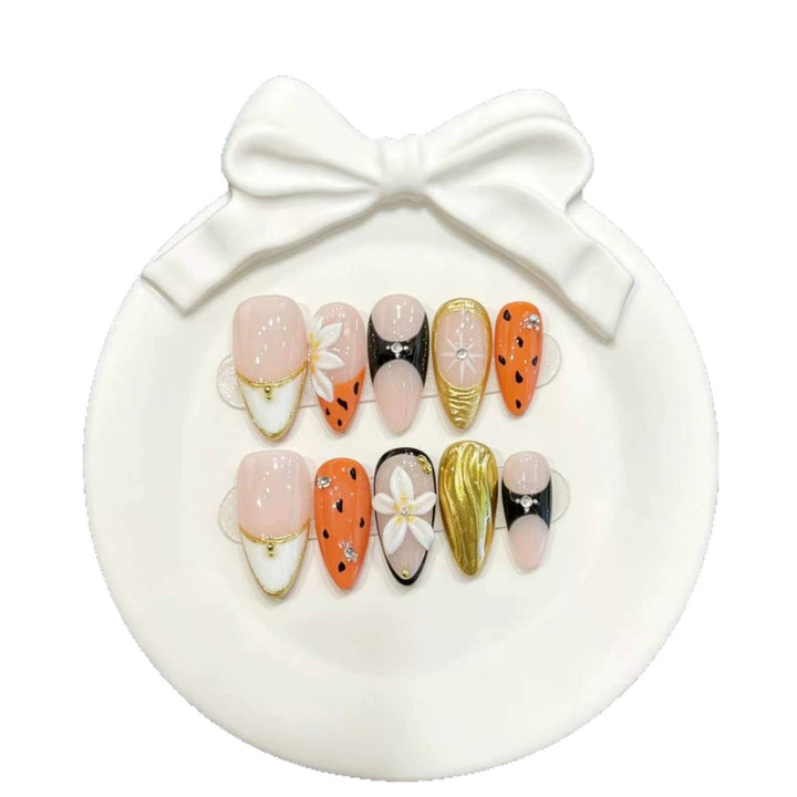 Decorative Press-On Nail Art Set with Floral and Metallic Accents