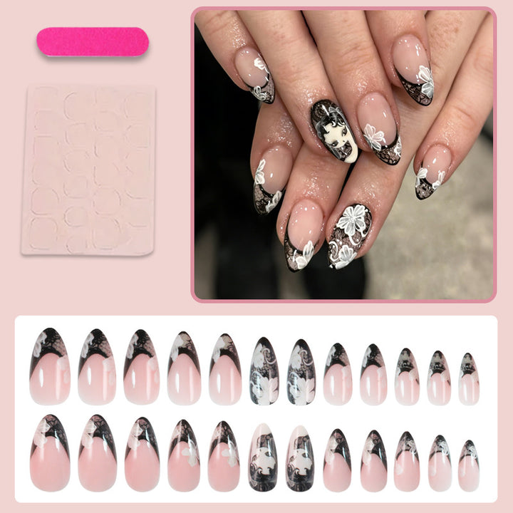 Artificial nail set with elegant tips and floral decorations Stornfield