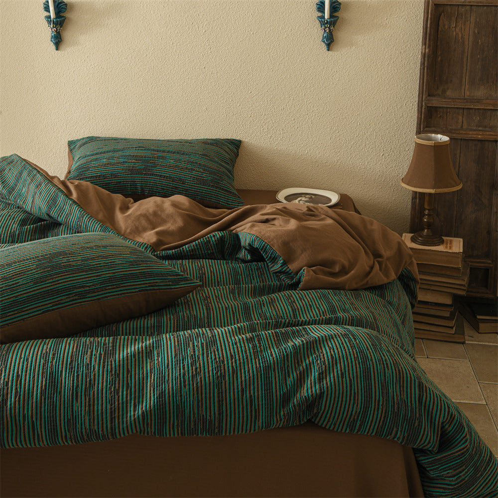 Reversible cotton satin bedding set with fine striped texture and velvet effect
