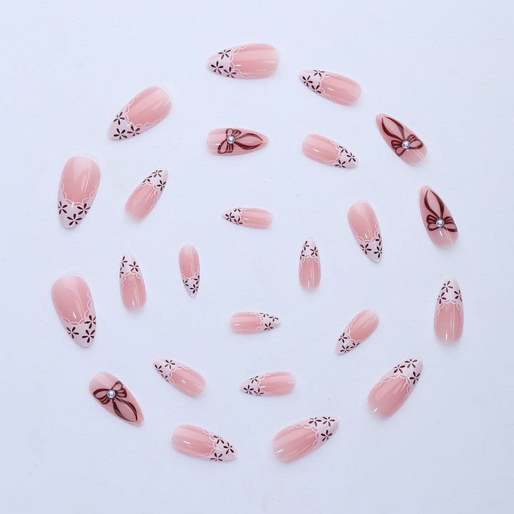 Elegant artificial nail design with floral accents Stornfield