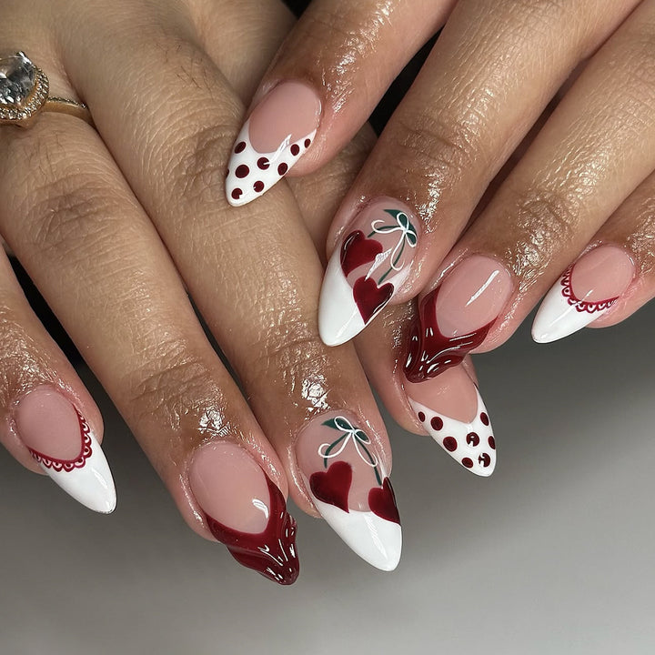 Creative nail art set with romantic heart design and playful accents Stornfield