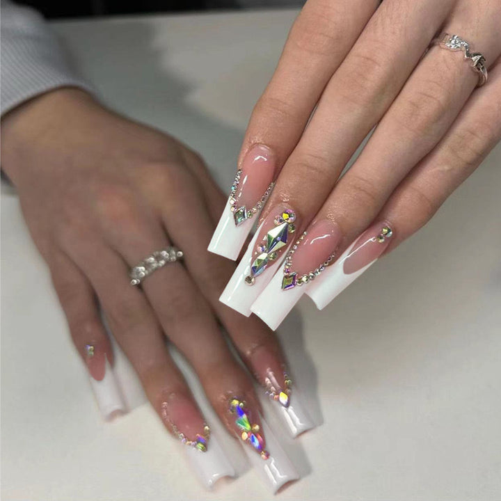 Acrylic nail set with elegant rhinestone decorations Stornfield