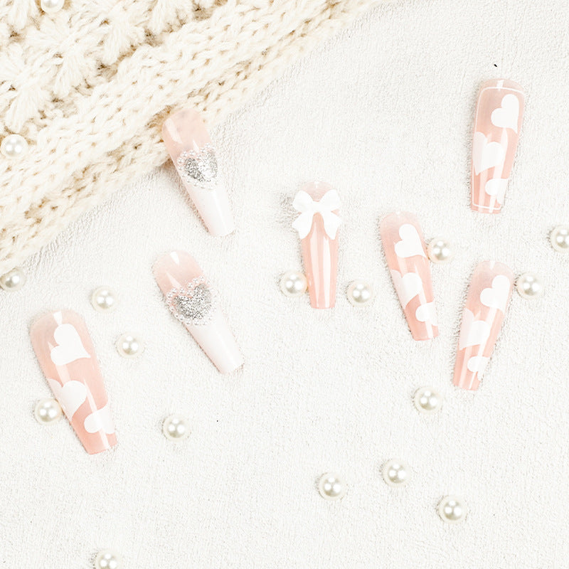 Artificial nail extensions with elegant floral design Stornfield