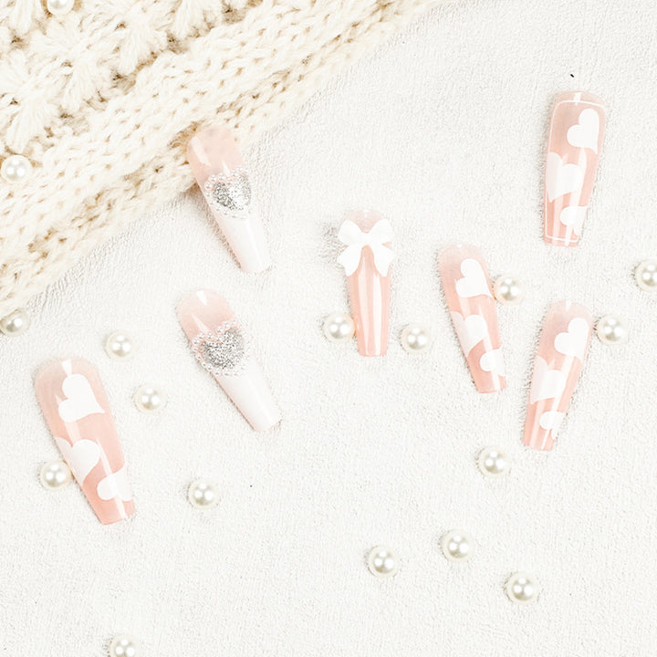 Artificial nail extensions with elegant floral design Stornfield