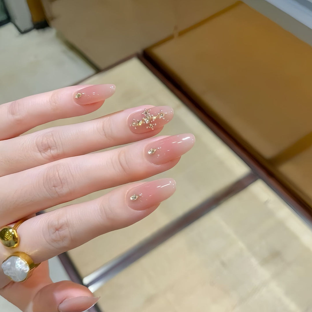 Acrylic nails with glamorous glitter pattern Stornfield