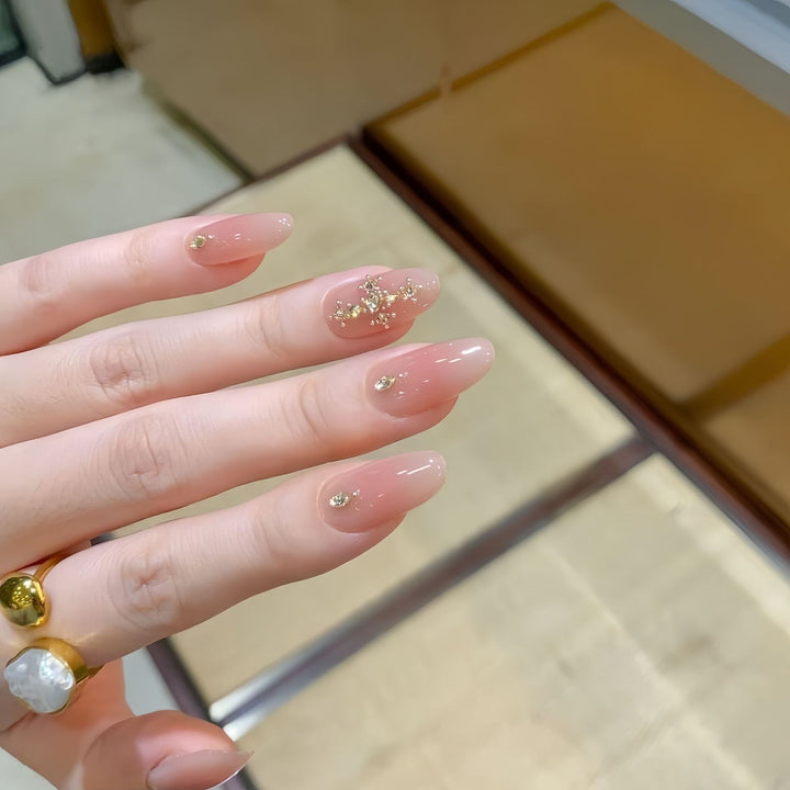 Acrylic nails with glamorous glitter pattern Stornfield