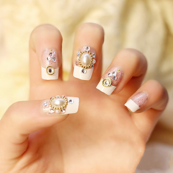 Artificial nails with elegant flower and rhinestone design Stornfield