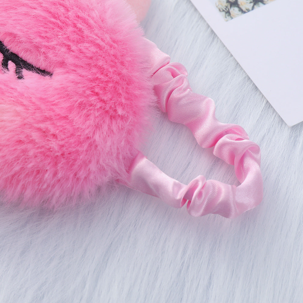 Women's plush-filled unicorn sleep mask with 3D horn, embroidered eyelashes and adjustable satin band Stornfield