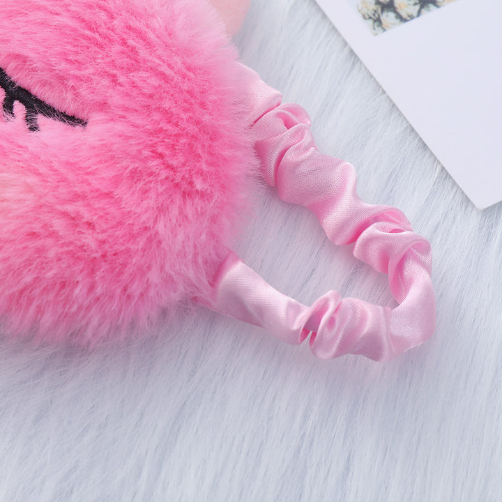 Women's plush-filled unicorn sleep mask with 3D horn, embroidered eyelashes and adjustable satin band Stornfield